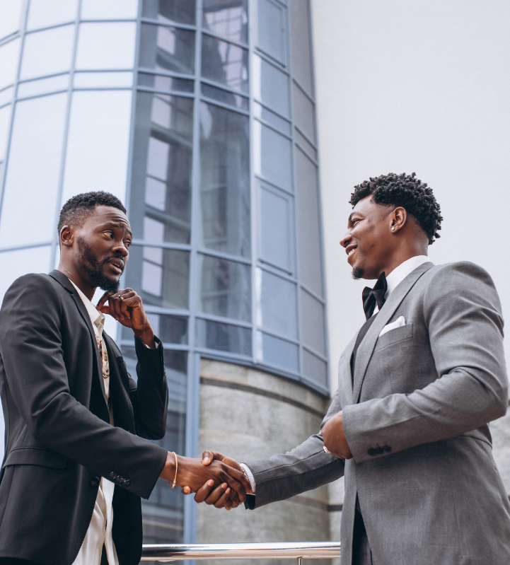 two african american men shaking hands